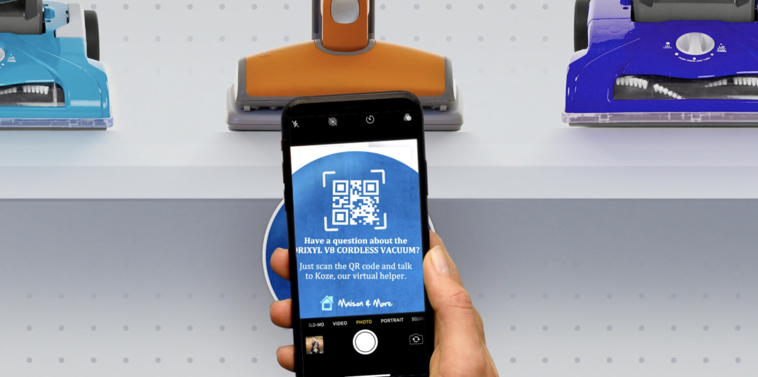 Shopper scanning QR code for virtual assistance, a part of conversational commerce while in store