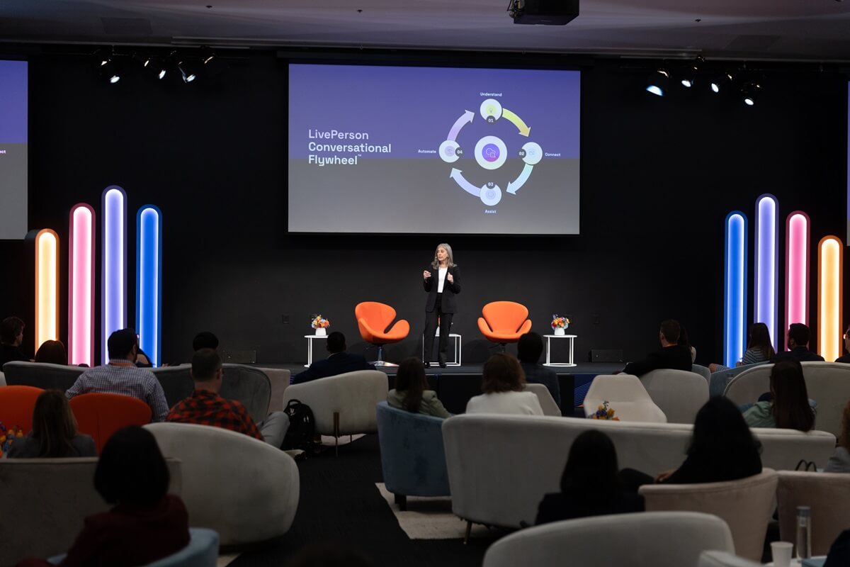 CMO Ruth Zive at a Spark keynote, sharing her experiences with needing a connected customer experience